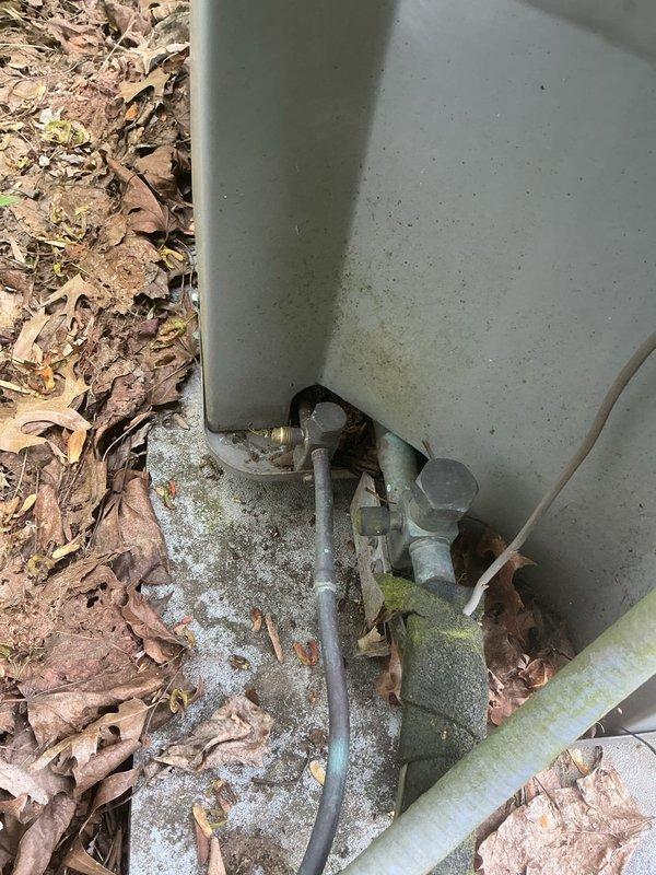 Completed annual cooling maintenance on 24-year-old ICP system. Inspected indoor unit including condensate drain pan, PVC drainage lines, and electrical connections; verified proper drainage function and cleared debris from outdoor unit base and surrounding area. All components operating within normal parameters; system ready for cooling season.