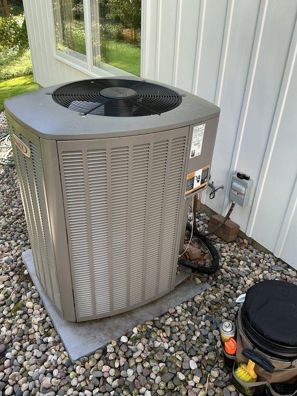 Completed annual cooling maintenance on a 16-year-old Lennox condenser unit (Model LMNXC15-036-230-03) containing R-410A refrigerant. Performed standard tune-up procedures including system inspection, cleaning, and operational testing to ensure proper function for the cooling season.
