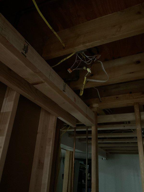 Responded to service call for installation of electrical outlets and switches in residential property. Upon arrival, assessed unfinished interior space with exposed framing and existing rough-in electrical wiring. Successfully installed requested outlets and switches per customer specifications, ensuring all connections were properly secured within junction boxes and compliant with current electrical code requirements. All installed devices tested and verified operational before completing service.