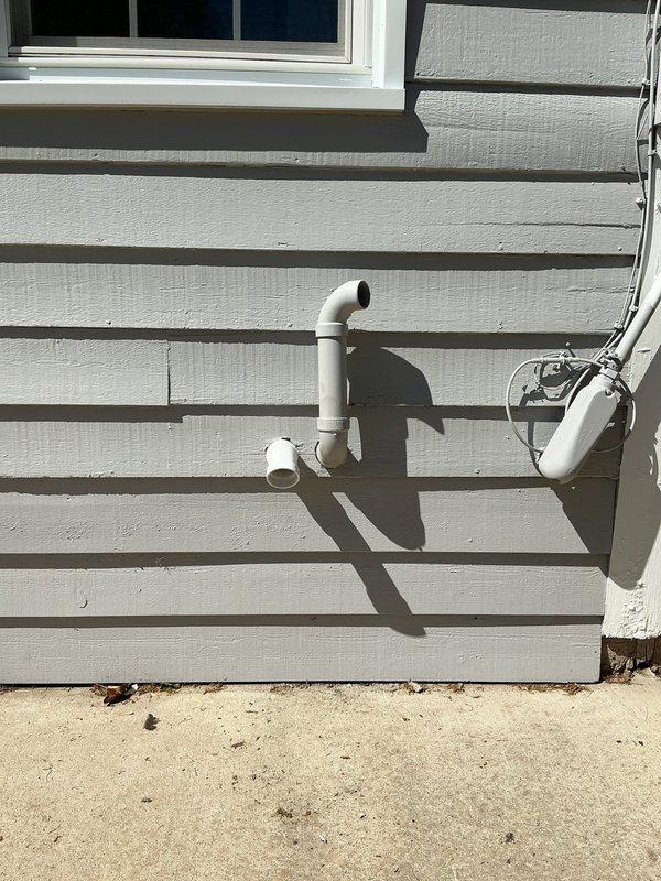 Responded to gas leak emergency and identified leak at sediment trap cap. Immediately shut off gas supply and electrical power to furnace for safety. Upon exterior inspection, discovered furnace intake and exhaust terminations were installed in incorrect order, requiring correction to meet code compliance.