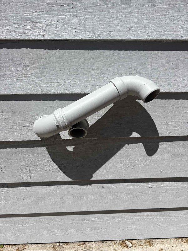 Responded to gas leak emergency and identified leak at sediment trap cap. Immediately shut off gas supply and electrical power to furnace for safety. Upon exterior inspection, discovered furnace intake and exhaust terminations were installed in incorrect order, requiring correction to meet code compliance.