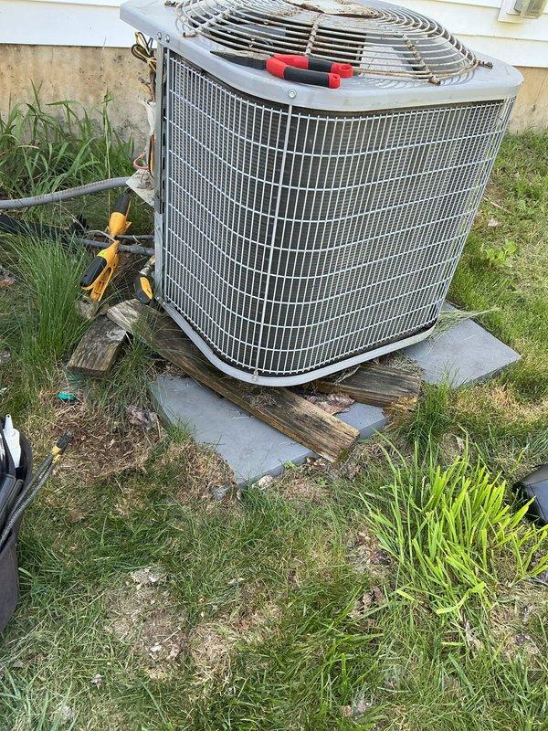 Completed annual cooling maintenance on a 9-year-old residential air conditioning system. Performed comprehensive inspection of outdoor condenser unit, including visual assessment of cabinet condition, fan assembly, and refrigerant line connections. Accessed electrical compartment and inspected contactor, capacitor, and all electrical connections for proper operation and signs of wear. Noted normal weathering and dirt accumulation consistent with outdoor equipment age. Documented unit condition with photographs showing external components, electrical panel, and mechanical connections. System operational and ready for cooling season.