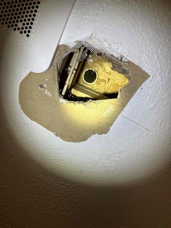 Responded to bathroom plumbing leak complaint and conducted thorough investigation of affected areas. Accessed ceiling cavity to locate source of water intrusion, identifying compromised plumbing fixture above bathroom space. Inspected sump pump system in lower level to assess drainage functionality and verify proper operation of moisture management equipment, ensuring no contributing factors to reported leak condition.