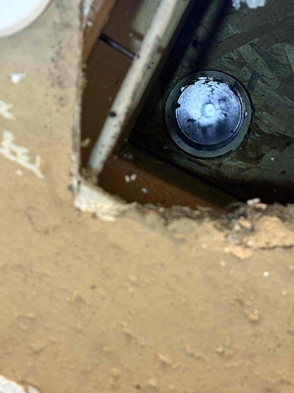 Responded to bathroom plumbing leak complaint and conducted thorough investigation of affected areas. Accessed ceiling cavity to locate source of water intrusion, identifying compromised plumbing fixture above bathroom space. Inspected sump pump system in lower level to assess drainage functionality and verify proper operation of moisture management equipment, ensuring no contributing factors to reported leak condition.