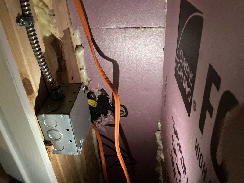 Installed one GFCI outlet in basement utility area for sump pump protection per quoted scope. Ran flexible metal conduit from new outlet box to power source, properly securing all components to wall surface. All work completed in accordance with electrical code requirements.