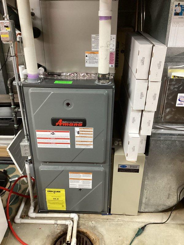Completed annual cooling maintenance on 5-year-old Carrier system. Performed comprehensive inspection of outdoor condenser unit and indoor air handling equipment, checked refrigerant levels, cleaned condenser coils, verified electrical connections, tested system operation and airflow, and documented equipment condition with photos. All components found operating within manufacturer specifications with no issues identified.