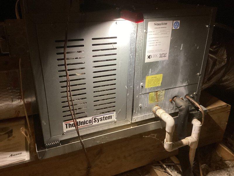 Completed comprehensive ASTU-AC Super Tune-up on 16-year-old Unico System air handler located in attic space. Performed thorough inspection of air handler unit, refrigerant lines, condensate drainage system, and flexible ductwork installation. Evaluated system performance and efficiency concerns related to elevated energy consumption during cooling season, conducted operational testing of all components, checked refrigerant charge levels, inspected electrical connections, cleaned condensate drain lines, examined ductwork for leaks or disconnections in insulation-filled attic space, and verified proper airflow throughout the system to identify potential causes of high utility costs.