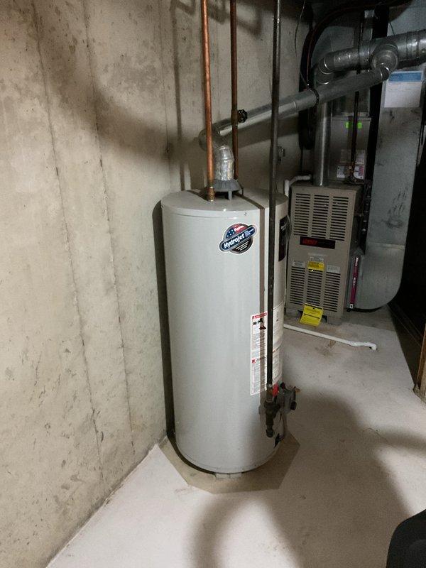 Completed combined furnace and water heater estimate for property in flood zone. Inspected 29-year-old Bradford White water heater and existing HVAC furnace system, verified sump pump operation to ensure proper functionality in case of water heater failure. Provided quotes for both equipment replacement and repair options, including recommendation for installation of drain pan under water heater for flood protection.