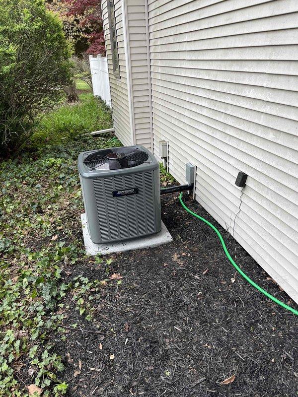 Completed full air conditioning system replacement including outdoor condensing unit and indoor air handler components. Installed new AC condenser on existing concrete pad in side yard with proper clearances and secured all refrigerant line connections. Replaced indoor air handler in basement mechanical room, integrated with existing furnace and ductwork system, and installed new PVC condensate drainage lines. Tested system operation, verified proper refrigerant charge, confirmed adequate airflow, and ensured all electrical connections met code requirements.