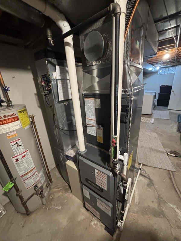 Completed full air conditioning system replacement including outdoor condensing unit and indoor air handler components. Installed new AC condenser on existing concrete pad in side yard with proper clearances and secured all refrigerant line connections. Replaced indoor air handler in basement mechanical room, integrated with existing furnace and ductwork system, and installed new PVC condensate drainage lines. Tested system operation, verified proper refrigerant charge, confirmed adequate airflow, and ensured all electrical connections met code requirements.