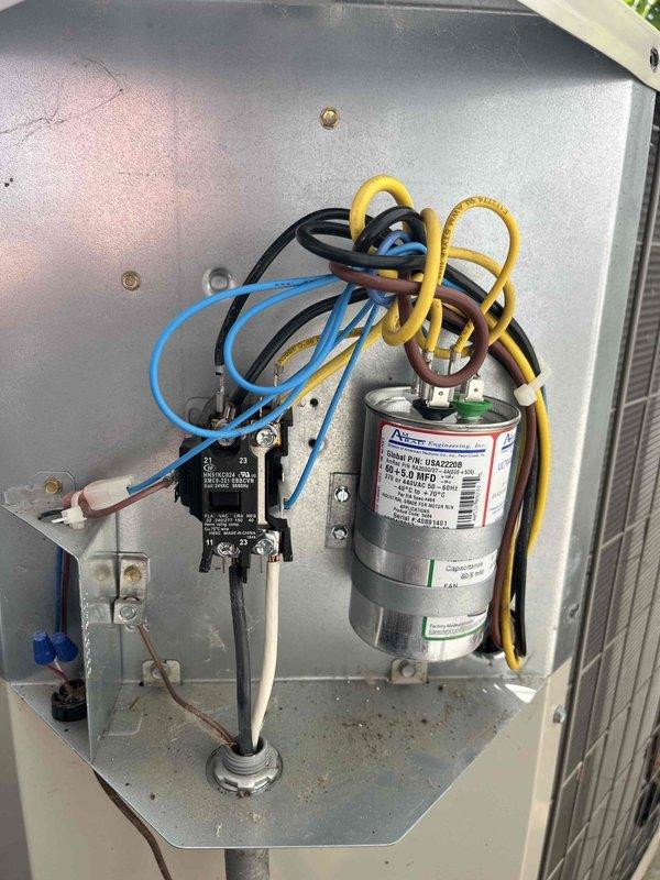 Completed annual cooling maintenance and 6-year equipment checkout on residential air conditioning system. Performed comprehensive inspection of electrical components including contactor, capacitor (60/5μF dual-run rated at 440V AC), and control wiring connections. All electrical connections were verified secure, capacitor tested within acceptable parameters, and contactor operation confirmed normal. System operational and ready for cooling season.