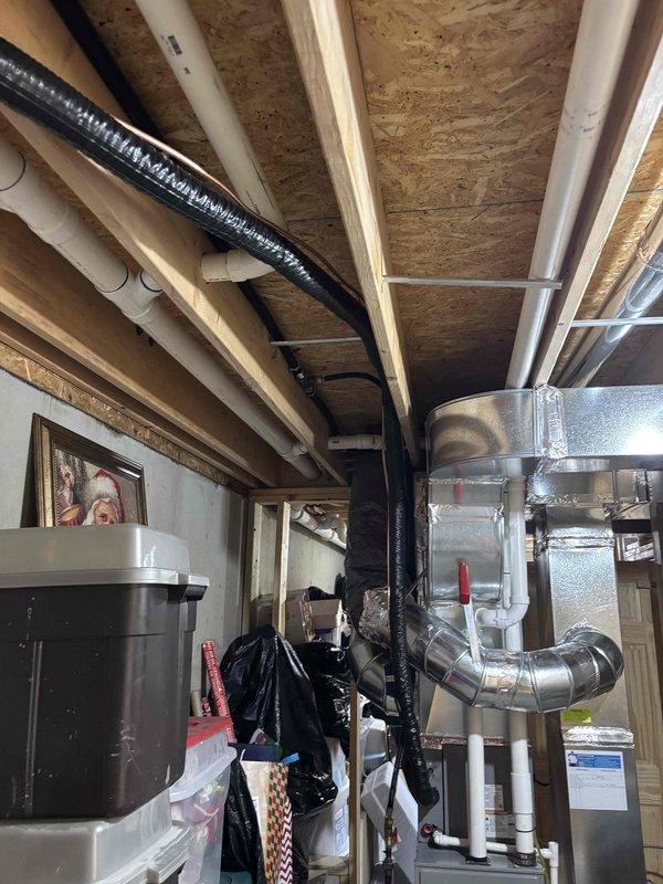 Replaced leaking refrigerant lineset on mini-split heat pump system, running new copper lines from outdoor condenser unit through building penetration to indoor air handler. Evacuated system, pressure tested for leaks, and recharged with proper refrigerant to manufacturer specifications.