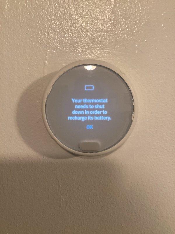 Returned to address no heat condition on 16-year-old Goodman furnace following previous day's service call for noise issues. Upon arrival, found Nest thermostat displaying low battery warning and shutting down to recharge, preventing heat call to furnace. Allowed thermostat battery to recharge, restored power to device, and verified proper communication between thermostat and heating system. Confirmed furnace operation and heat delivery, with thermostat successfully calling for and maintaining 68° setpoint.