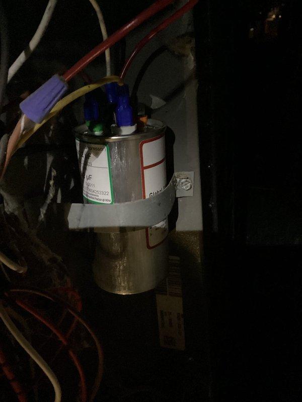Responded to no cooling call on 15+ year old system. Found outdoor unit running but indoor blower motor not operating despite audible humming sound indicating attempted operation. Diagnosed failed capacitor preventing blower motor from starting. Replaced defective capacitor, tested system operation, and verified proper airflow restored with both outdoor unit and indoor blower functioning normally.