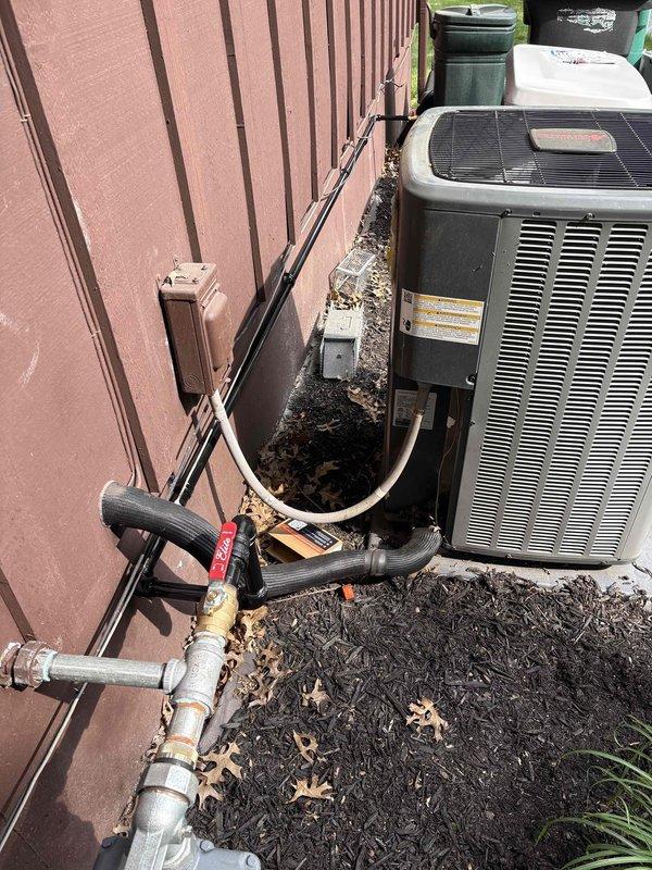 Successfully installed a 14KW standby generator with 150A automatic transfer switch at residential property. Coordinated utility disconnect and reconnect services to safely complete electrical connections, obtained and passed electrical permit inspection, and completed all required municipal permitting requirements. Generator unit was positioned on concrete pad in exterior utility area alongside existing HVAC equipment, with proper clearances maintained for ventilation and service access. Installed all necessary fuel lines, electrical conduit, and transfer switch wiring per manufacturer specifications and local electrical code. System was tested for proper operation including automatic transfer functionality and verified all connections were secure and weatherproof.