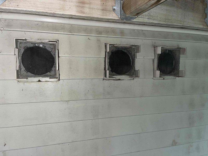 Responded to customer complaint of water heater not producing hot water. Upon arrival, inspected 15-year-old water heater unit and associated ventilation system. Found heavily clogged intake air filter with significant accumulation of dust, dirt, and debris restricting proper airflow to combustion chamber. Cleaned filter and verified proper ventilation through all three wall-mounted vent openings. Restored adequate air supply to unit, enabling proper combustion and heat transfer. Water heater returned to normal operation with hot water production restored.