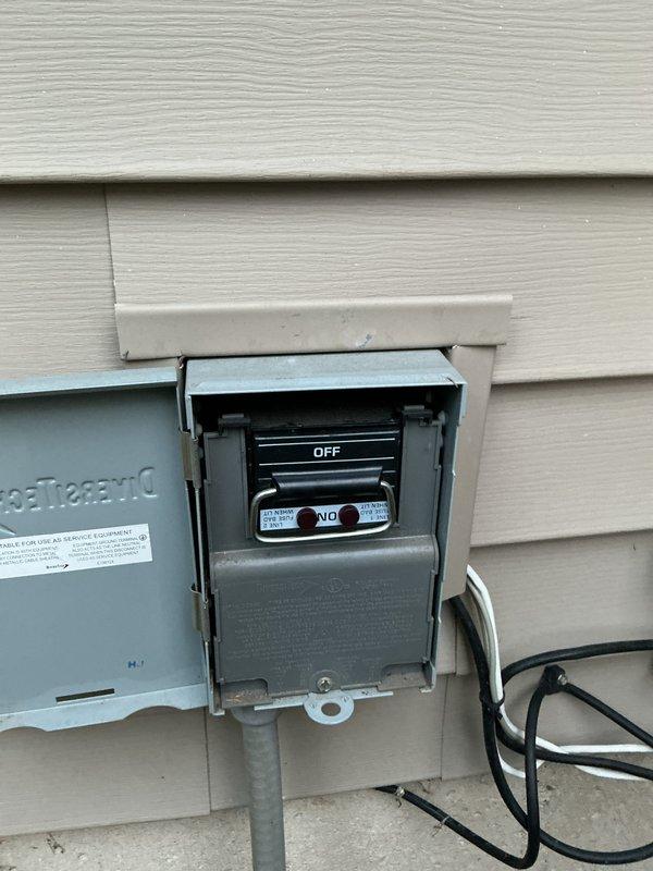 # CP-Cooling Problem Resolution

Responded to a no-cooling call on a commercial refrigeration system. Upon arrival, found the outdoor condensing unit disconnect switch in the OFF position. Inspected the Heatcraft equipment installation and associated electrical components mounted on the building exterior. Verified proper electrical connections at the disconnect box and control panel. Cycled the disconnect switch to restore power to the system. Confirmed unit operation and proper electrical supply. System returned to normal cooling operation.