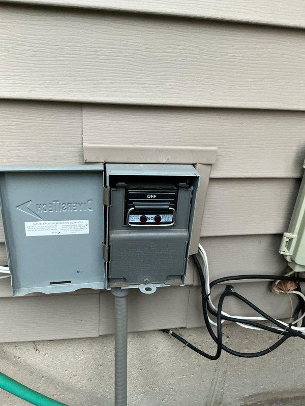 # CP-Cooling Problem Resolution

Responded to a no-cooling call on a commercial refrigeration system. Upon arrival, found the outdoor condensing unit disconnect switch in the OFF position. Inspected the Heatcraft equipment installation and associated electrical components mounted on the building exterior. Verified proper electrical connections at the disconnect box and control panel. Cycled the disconnect switch to restore power to the system. Confirmed unit operation and proper electrical supply. System returned to normal cooling operation.