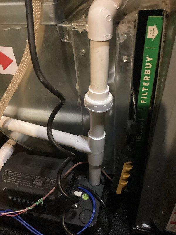 Completed annual cooling maintenance on 21-year-old Goodman AC system. Upon inspection, discovered evaporator coil completely frozen with heavy ice and frost buildup throughout the entire coil assembly. Identified airflow restriction as primary cause of freezing condition. Found dirty air filter (FilterBuy brand) requiring replacement. Shut down system to allow ice to thaw completely before proceeding with diagnostic testing. Inspected refrigerant lines and connections - copper lines intact with proper insulation. Checked electrical connections and wiring at control board - all secure with proper terminations. After ice melt, verified blower motor operation and airflow through system. Replaced air filter with new unit to restore proper airflow. Tested system operation after thaw cycle completed. Checked refrigerant pressures and system performance. System restored to normal operating condition with adequate airflow and no further freezing observed during test run.