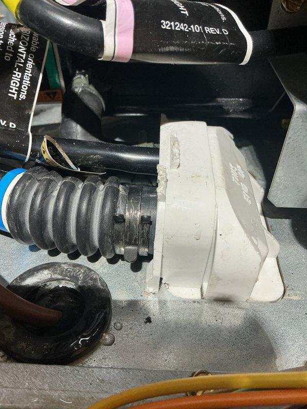 Completed annual cooling system maintenance and inspection on EnergiAir unit under active warranty coverage. Performed comprehensive tune-up including system diagnostics, refrigerant level verification, electrical component testing, and airflow assessment. Documented existing conditions including rust staining on drain pan and condensate drainage system configuration with photographic evidence for warranty records.