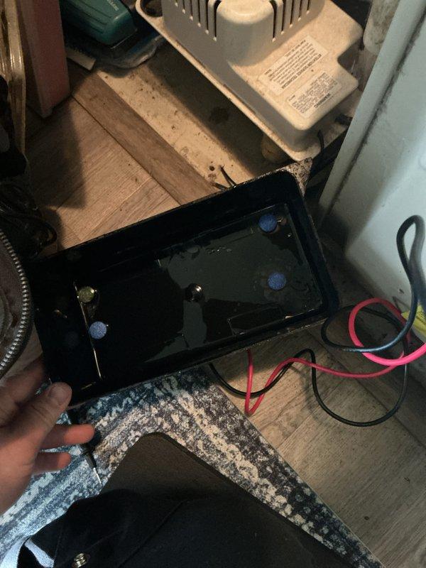 Completed annual cooling maintenance on 22-year-old Amana system. Inspected and serviced condensate pump system in basement utility area, verified proper drainage and water collection in pan. Opened and cleaned blower assembly, removing significant accumulation of dust and lint from blower housing and motor compartment. Verified electrical connections, checked system operation, and documented equipment condition with photos for customer records.