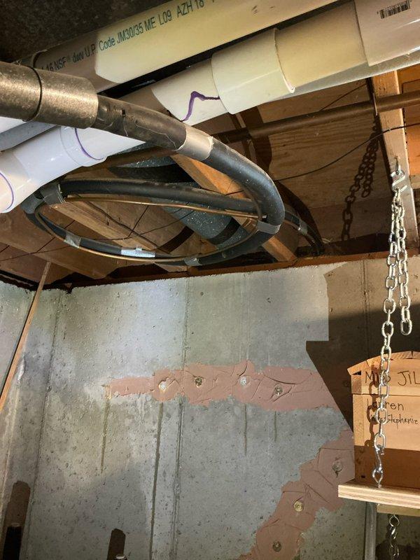 Provided estimate for complete replacement of 25-year-old Lennox air conditioning system. Inspected existing HVAC equipment in basement utility area, documented current furnace and ductwork configuration, and assessed installation requirements for new AC unit replacement.
