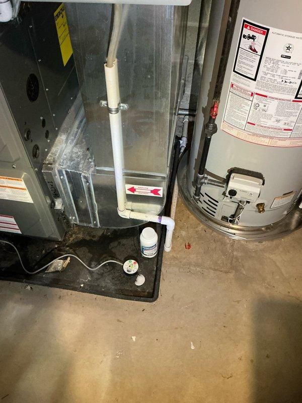 Provided estimate for complete replacement of 25-year-old Lennox air conditioning system. Inspected existing HVAC equipment in basement utility area, documented current furnace and ductwork configuration, and assessed installation requirements for new AC unit replacement.