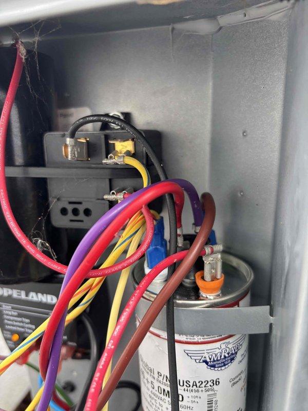 Responded to no cool call with outdoor unit fan not operating. Upon inspection, found failed run capacitor preventing condenser fan motor from starting. Replaced defective capacitor with proper replacement rated to manufacturer specifications, verified all electrical connections secure, and tested system operation with successful fan motor startup and normal cooling cycle restored.