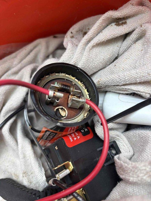Responded to cooling complaint on recently installed EnergiAir WT 04-2036 system not maintaining thermostat setpoint. Upon arrival, performed diagnostic testing and temperature measurements throughout the home to verify inadequate cooling performance. Inspected system components including electrical connections and capacitor. Documented findings with photos showing capacitor inspection and temperature readings using digital measurement equipment. System producing cool air but not achieving desired temperature differential compared to previous unit, indicating potential refrigerant charge issue, airflow restriction, or equipment sizing concern requiring further evaluation.