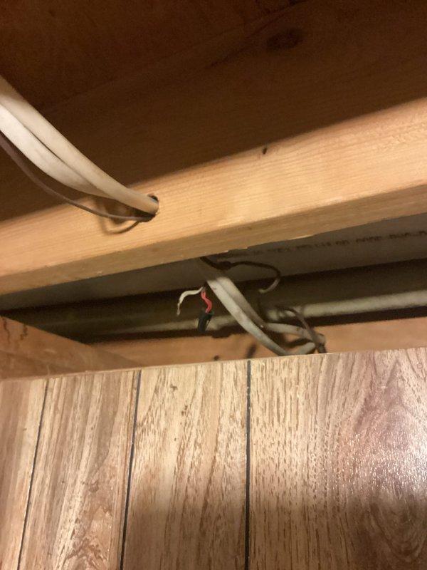 # CP-Cooling Problem

Responded to no cooling call on 24-year-old Lennox air conditioning system. Upon inspection, found disconnected low voltage wiring at air handler located in confined space above living area. Reconnected thermostat control wires to proper terminals, verified secure connections, and restored power to unit. System tested successfully with compressor engaging and air handler operating normally.