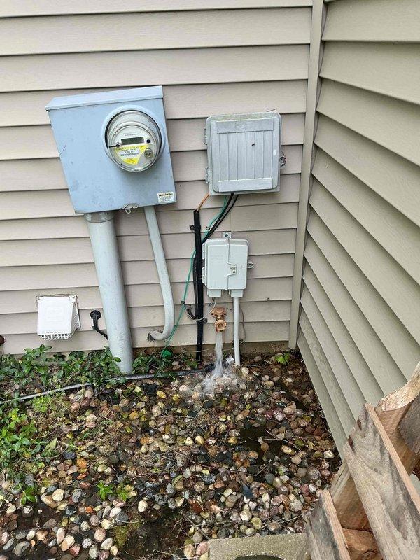Responded to a call for a leaking exterior spigot causing water infiltration into the basement. Upon inspection, located the failed hose bib on the exterior wall near the utility meter installation and traced the supply line through the basement ceiling where active leaking was observed along the copper piping. Completed necessary repairs to the spigot assembly and verified all connections were secure with no further water discharge into the basement area.