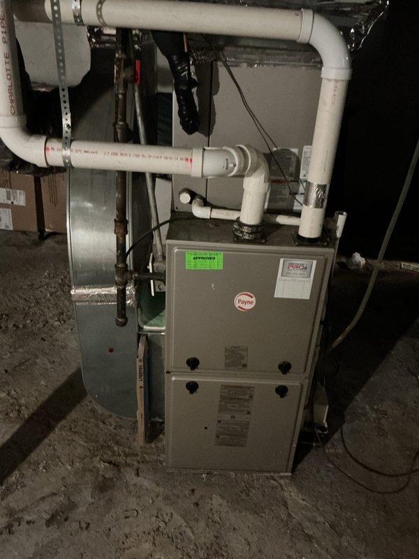 Performed comprehensive AC tune-up on 9-year-old Payne CNPVP3617ALA4AAA cooling system utilizing R-410A refrigerant. Unit was operational and blowing cool air upon arrival. Completed full system inspection including electrical connections, refrigerant levels, condensate drainage, and overall component functionality. Replaced air filter which had not been serviced since previous maintenance visit. Verified proper airflow, checked thermostat operation, and confirmed system cycling correctly. All safety controls tested and found operational. System left in proper working condition with improved airflow efficiency following filter replacement.