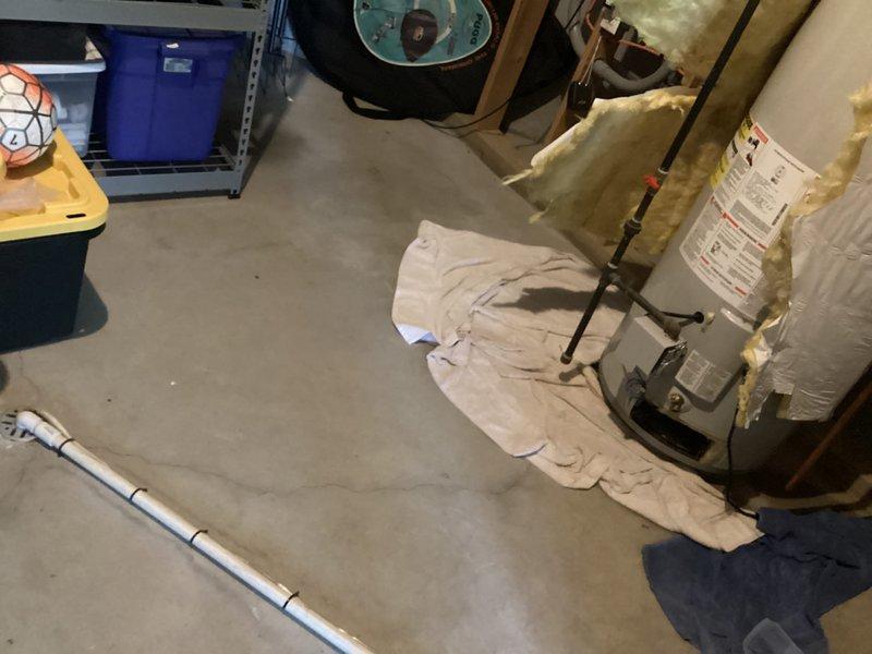 Provided water heater replacement estimate for residential property. Assessed existing water heater installation in basement utility area, documented current plumbing configuration including vertical PVC piping system and connection points, and prepared comprehensive replacement proposal for client requesting expedited installation timeline.