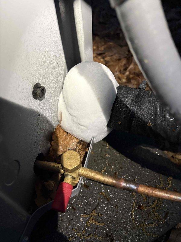 Responded to new AC installation reporting beeping error code and "Call for Service" message upon first startup. Inspected outdoor unit refrigerant line connections and indoor air handler components. Found condensate drain system and refrigerant lines properly installed with appropriate insulation and mounting. Verified all mechanical connections secure and properly sealed. System operational issue resolved, unit tested and confirmed cooling cycle functioning normally without error codes.