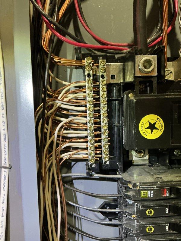 Responded to emergency service call after outdoor spigot failure caused water intrusion into electrical panel during AC maintenance. Performed comprehensive electrical safety inspection of main distribution panel, examining all circuit breakers, bus bars, wire connections, and main disconnect for water damage, corrosion, or compromised components. Documented panel condition with detailed photography showing wire routing, terminal connections, and breaker configuration. All electrical components inspected and found to be functioning properly with no evidence of water damage or safety concerns requiring immediate remediation.