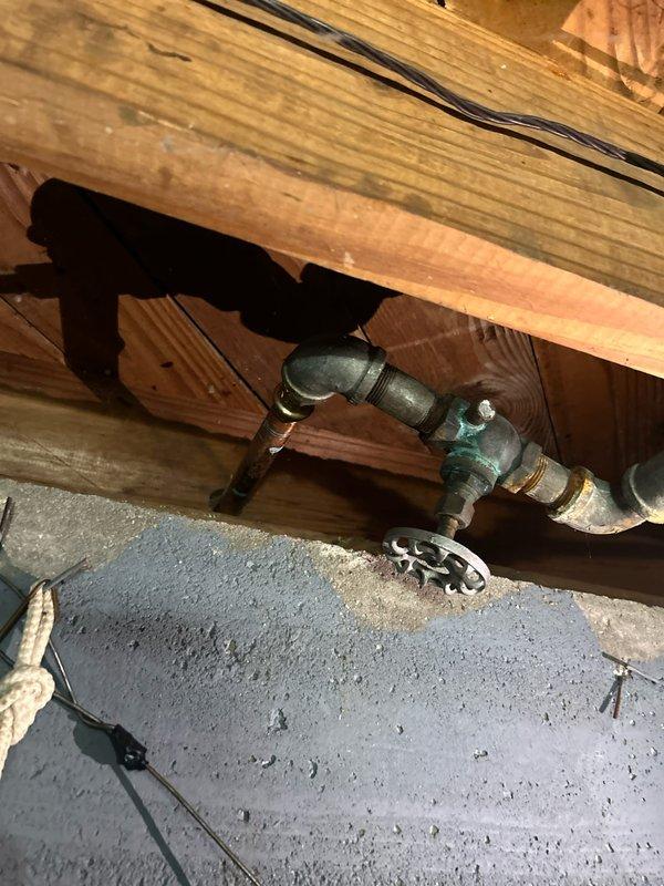 Responded to multiple plumbing leak issues including a leaking outdoor spigot previously replaced in 2023 and a leaking furnace condensate drain line in the crawl space. Assessed standing water accumulation approximately one foot from the drain area and inspected drainage system for proper function. Additional service requests included evaluation of a toilet that runs intermittently after flushing and consultation for bidet seat installation.