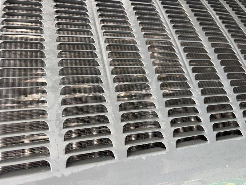 Completed comprehensive AC Super Tune-up on residential air handler system. Inspected evaporator coil fins showing good condition with uniform spacing and proper airflow capacity, verified condensate drainage lines and PVC piping connections secure and functioning properly, and documented all manufacturer specifications and equipment labels present on unit. System operating efficiently with all components in good working order.