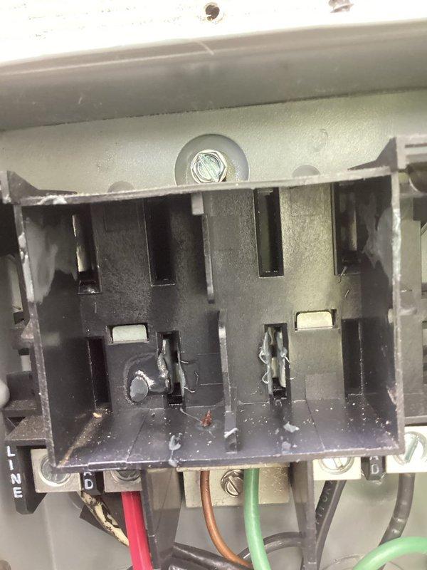 Responded to no cooling complaint on a 2-year-old system. Upon inspection, found failed contactor with welded contacts preventing proper compressor operation. Replaced defective contactor with new unit, verified all electrical connections were secure and properly terminated, and tested system operation. Unit now cooling properly with contactor engaging and disengaging as designed.