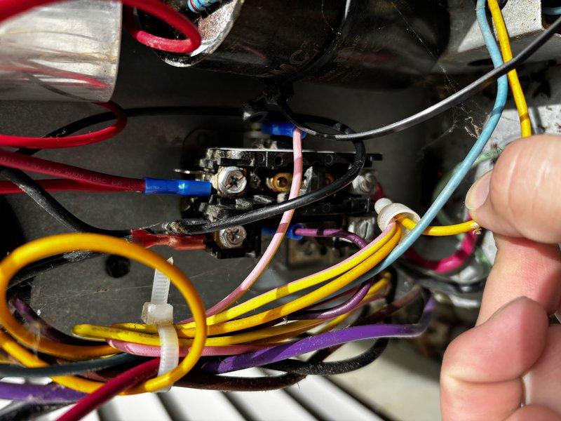 Responded to no cooling call affecting entire home on EnergiAir system installed August 2023. Upon arrival, performed diagnostic evaluation of outdoor condensing unit. Identified failed contactor with visible corrosion on mounting hardware and electrical connections. Contactor showed signs of age-related deterioration with accumulated debris around electrical components. Removed defective contactor assembly and disconnected multiple circuit wires including line voltage and control wiring. Installed replacement contactor, reconnected all electrical terminations to proper terminals, and verified secure wire connections. Tested system operation and confirmed proper startup sequence with contactor engaging correctly. System restored to full cooling operation with all safety controls functioning as designed.