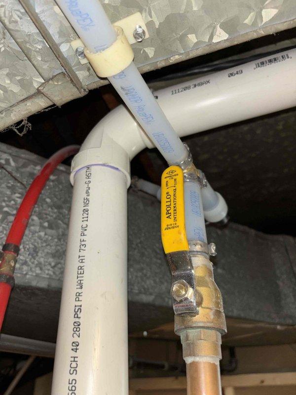 Completed installation of a 50-gallon Bradford White power vent natural gas water heater with 6-year warranty. All plumbing connections were made using copper piping with proper fittings, PVC venting was installed per manufacturer specifications, and the unit was secured and tested for proper operation. The installation included connection to existing gas supply, cold water inlet with isolation valve, hot water outlet, temperature and pressure relief valve discharge piping, and verification of all safety controls and venting systems for code compliance.