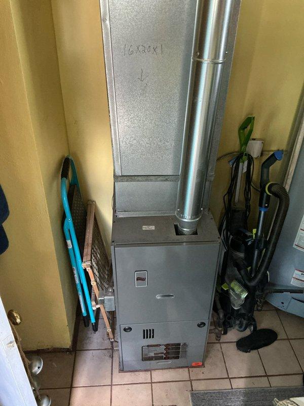 Completed estimate for whole-home air conditioning system installation for approximately 875 square foot residence with existing ductwork from furnace. Assessed utility room containing furnace with 16x32x1 filter dimensions and existing ductwork infrastructure, confirmed compatibility for AC integration. Evaluated electrical panel to determine if upgrade required for new cooling system installation.