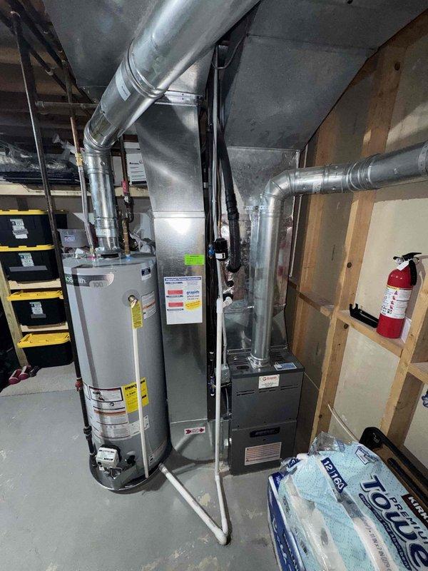 Responded to service call for York air conditioning system with no cooling. Performed diagnostic assessment of 7-year-old unit and documented existing HVAC equipment configuration including furnace, ductwork, and utility room layout. Completed visual inspection and photographic documentation of equipment condition to provide estimate for repair recommendations.
