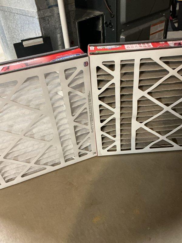 Completed annual cooling maintenance on 12-year-old EnergiAir system with 2019 condenser. Replaced heavily soiled air filter with new filter, documenting significant dust and debris accumulation on original filter. Inspected evaporator coil and discovered excessive frost buildup on coil surfaces and interior cabinet walls, indicating potential airflow restriction or refrigerant issue. Documented refrigerant line routing and frost conditions. System requires follow-up to address freezing condition and verify proper airflow and refrigerant charge levels.