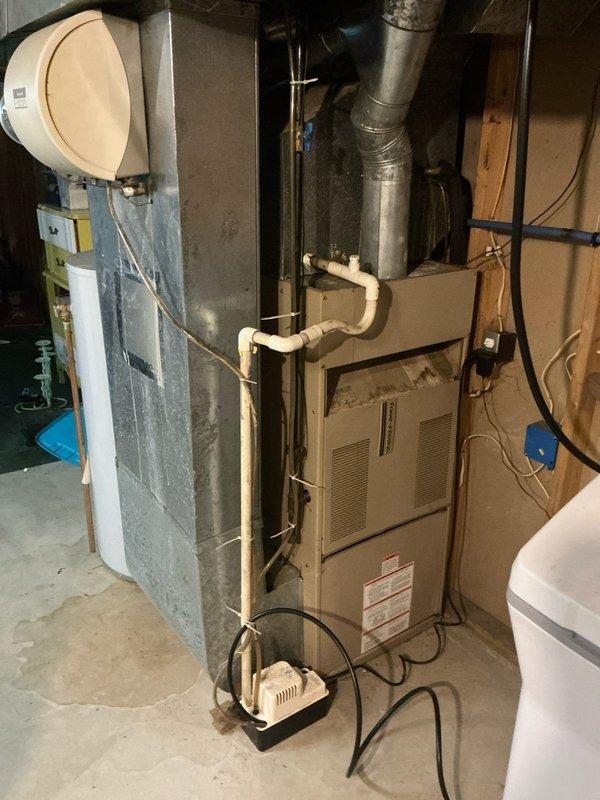 Provided estimate for complete HVAC system replacement including R22 air conditioning unit and 70% efficiency furnace. Existing AC system found with severe refrigerant loss, icing on both indoor and outdoor refrigerant lines, and restricted airflow despite operational blower motor. Seven-year-old ICP system deemed beyond economical repair due to obsolete R22 refrigerant and multiple component failures affecting whole-house comfort.