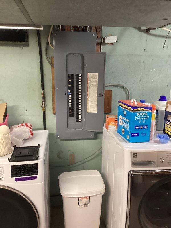Provided estimate for replacement of 1988 Trane R-22 outdoor condensing unit and matching indoor evaporator coil with new two-stage AC system utilizing current refrigerant technology. Assessed compatibility of existing 2005 Goodman GMS9/GCS9 gas furnace with single-speed PSC blower for integration with proposed modern AC equipment. Evaluated trunk-and-branch ductwork configuration in basement for installation of two-zone control system with motorized dampers, designating Zone 1 for upstairs and Zone 2 for main floor plus basement. Recommended bypass damper solution for static pressure management due to single-speed blower limitation, as blower modulation not feasible with existing PSC motor. Specified smart thermostat configuration supporting two-stage cooling with Y1/Y2 signaling capability for proper system staging and zone control.