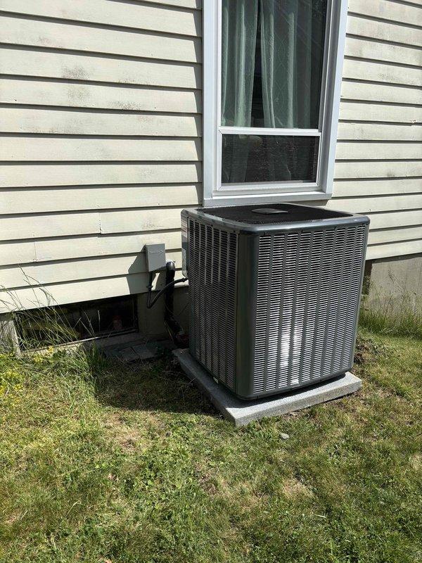 Completed full air conditioning system replacement including outdoor condensing unit installed on concrete pad with proper electrical disconnect and indoor air handler integrated with existing Lennox furnace system. All refrigerant lines, condensate drainage, and electrical connections properly installed and tested. System commissioned and verified operational with appropriate airflow and cooling performance.