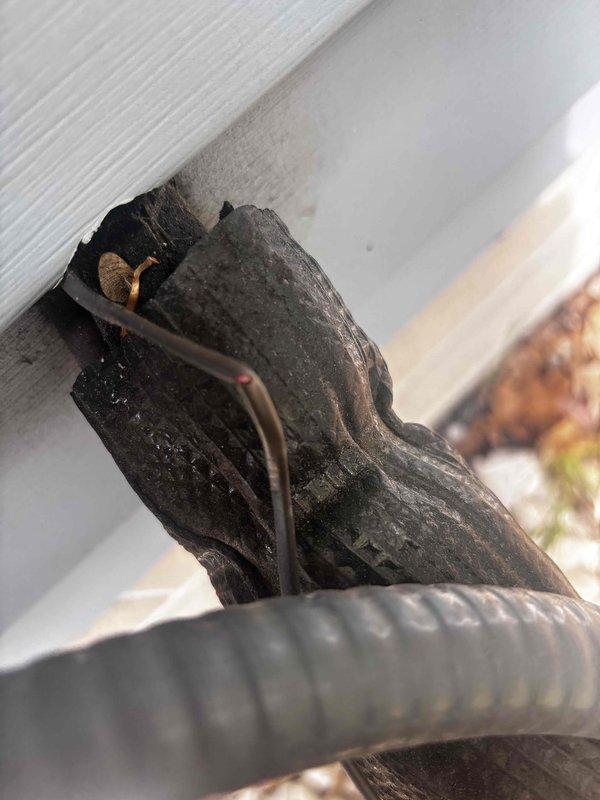 Responded to no cooling call on 2020 Goodman system. Upon inspection, discovered severely burnt contactor and melted wiring at outdoor unit, indicating electrical failure that prevented compressor operation. Removed damaged contactor with burnt O-ring seal and replaced with new component. Inspected system integration between recently installed furnace and existing AC unit, confirmed proper wiring connections and verified thermostat communication. Tested system operation, confirmed compressor startup, and verified proper cooling cycle restoration.