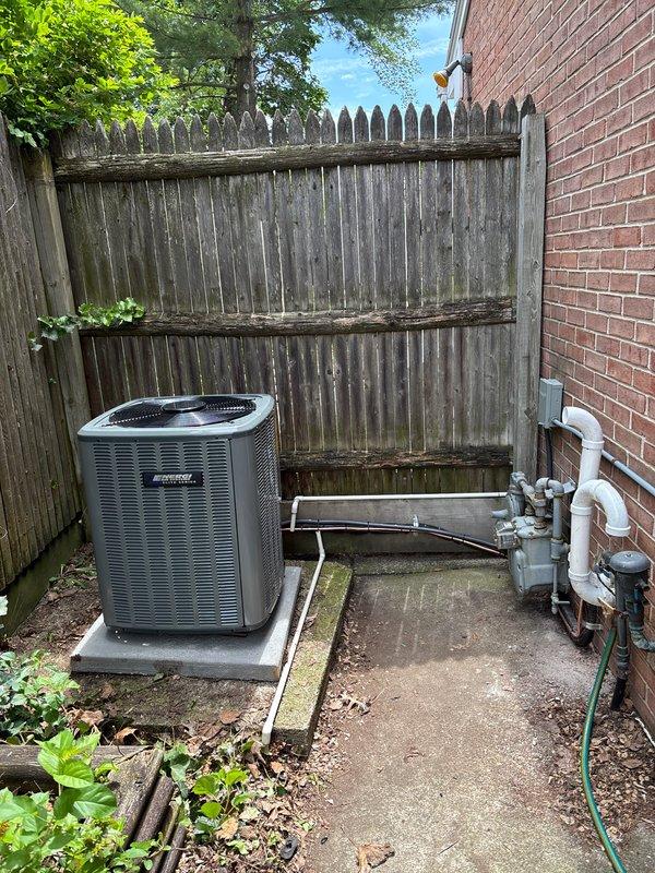 Completed full HVAC system installation including new furnace and air conditioning condenser unit. Installed outdoor AC condenser on concrete pad against rear privacy fence with proper clearances maintained. Ran and connected refrigerant lines, electrical connections, and condensate drainage utilizing copper piping, PVC drain lines, and appropriate shut-off valves mounted to exterior brick wall. Installed gas line connections with safety valves for furnace operation. Verified all electrical connections, tested system startup and operation, confirmed proper airflow and refrigerant charge levels. All equipment labeled with manufacturer specifications and safety warnings. System tested and operating within normal parameters upon completion.