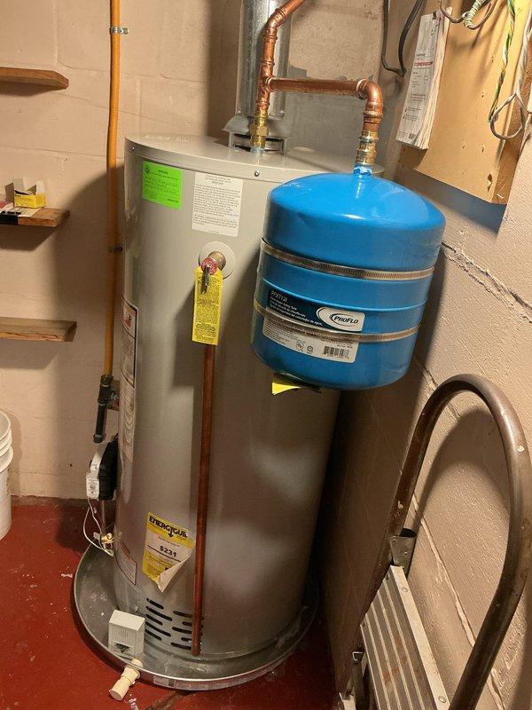 Completed annual cooling maintenance on 15-year-old Goodman HVAC system. Inspected air handler with 20x25x4 MERV 13 filter, verified proper airflow direction, checked all electrical connections, and tested system operation. Documented equipment condition with photographs showing furnace, air handler, and associated plumbing components all functioning within normal parameters.