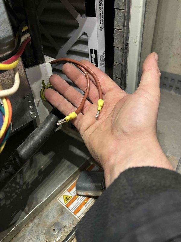 Completed annual cooling maintenance on 2021 EnergiAir system under 4-year warranty coverage. During inspection, identified failed thermistor temperature sensor with damaged wire leads. Replaced defective sensor and associated electrical connectors, ensuring proper termination with new spade and ring terminals. System tested and verified operational following component replacement.